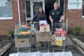 young farmers with trollies full of food donations