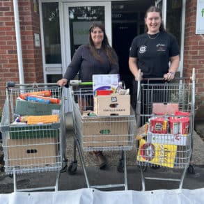 young farmers with trollies full of food donations