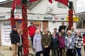 East Cowes Crafters remembrance displays - crafters gathered with councillor Love and his partner