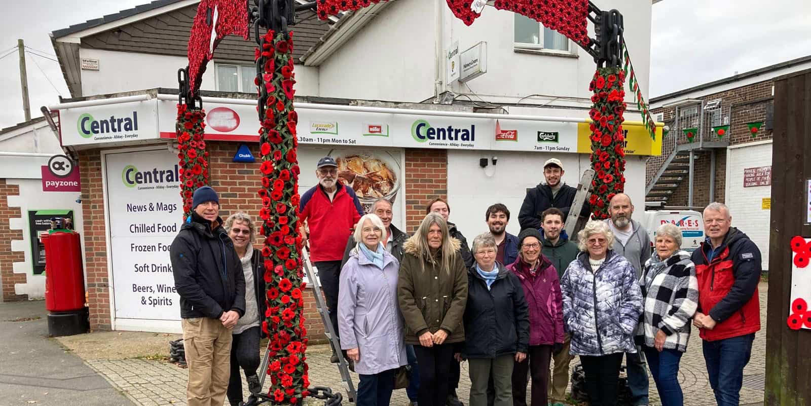 East Cowes Crafters remembrance displays - crafters gathered with councillor Love and his partner