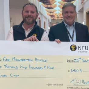 John Heather, Nigel Hartley and Mountbatten nurses with giant cheque