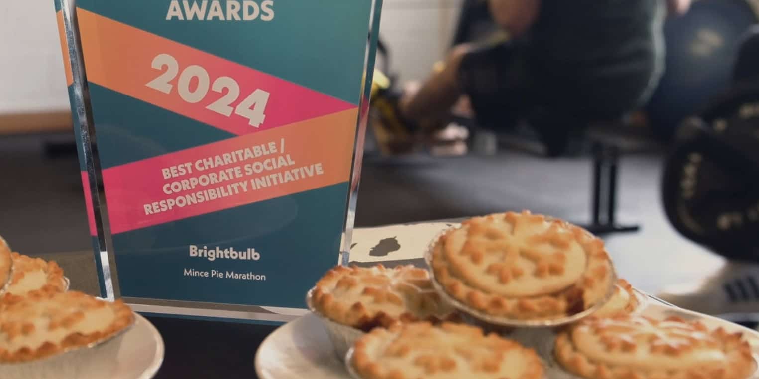 A plate of mince pies alongside an award