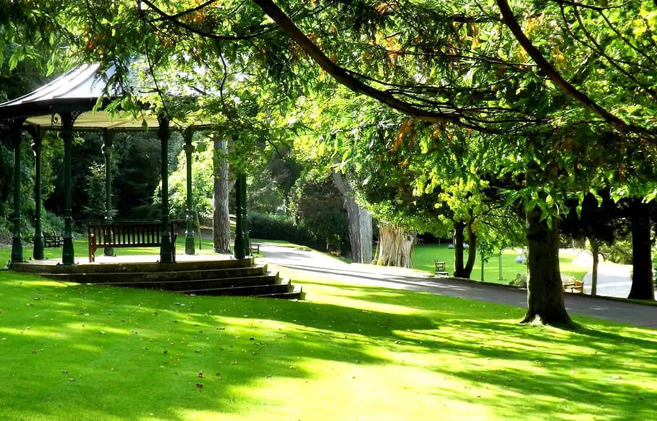 Ventnor Park bandstand with sun dapples on the grass