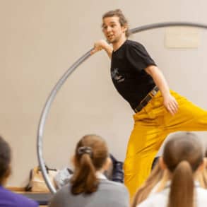 Thorn on the acrobat's wheel showing pupils his skills