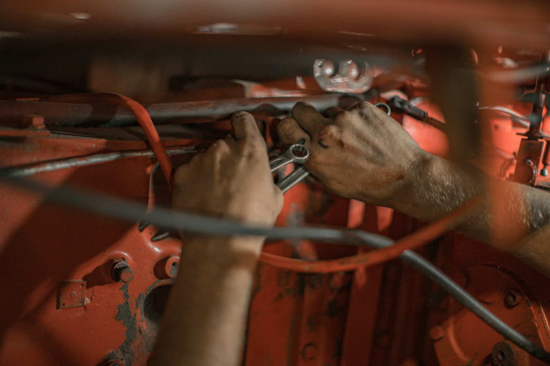 mechanic working on a car