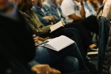 people sat in a meeting