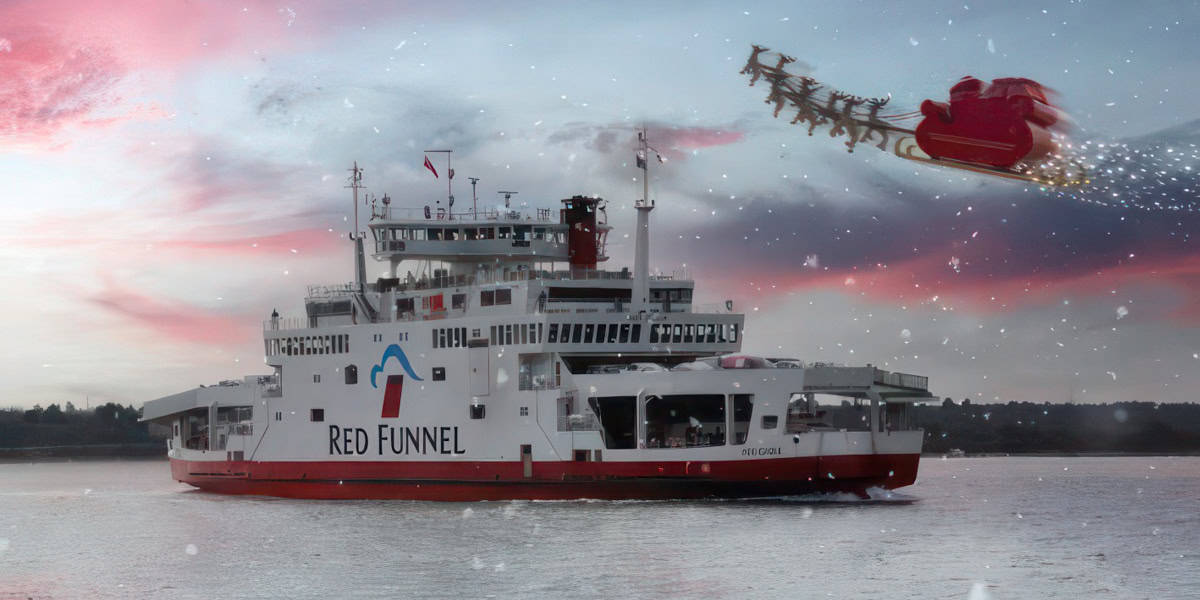 Red Funnel Ferry on the Solent, with snow in the air and Father Christmas with sleigh and reindeer flying past