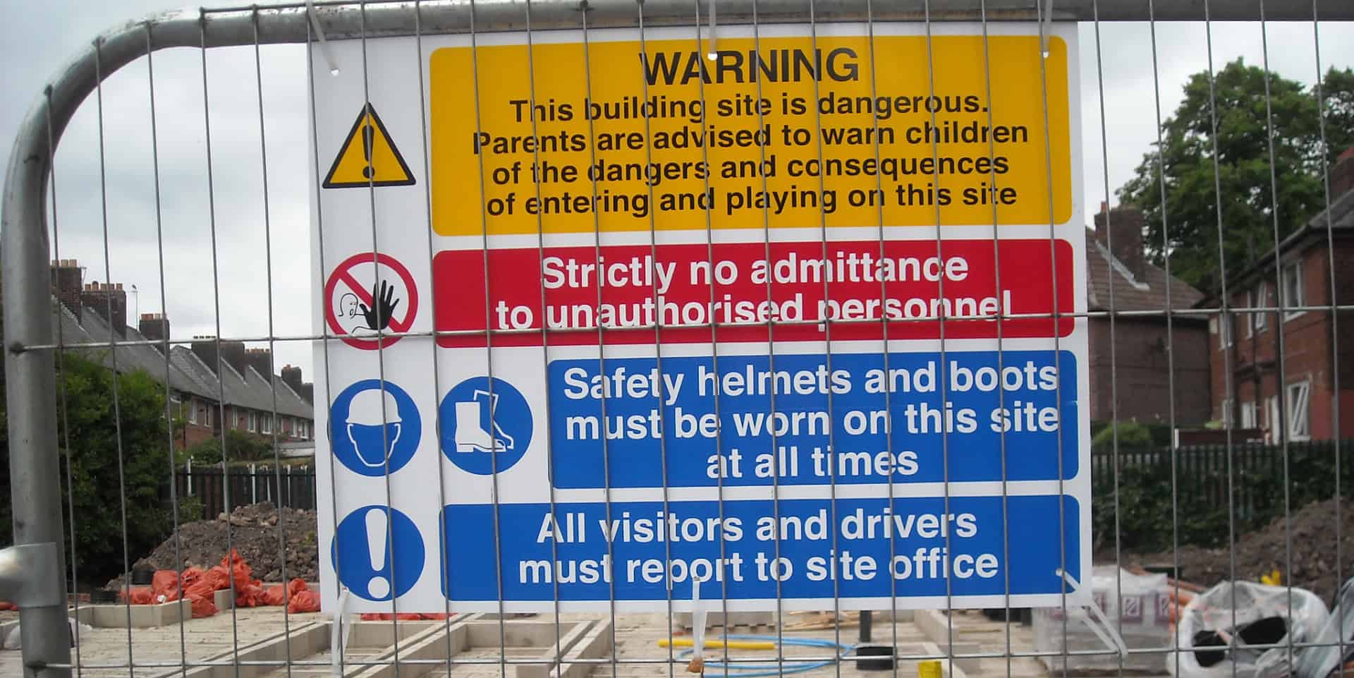 Building site with warning sign