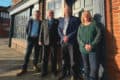 CAB staff and Robert outside the new building