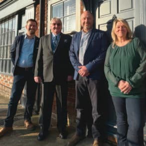 CAB staff and Robert outside the new building