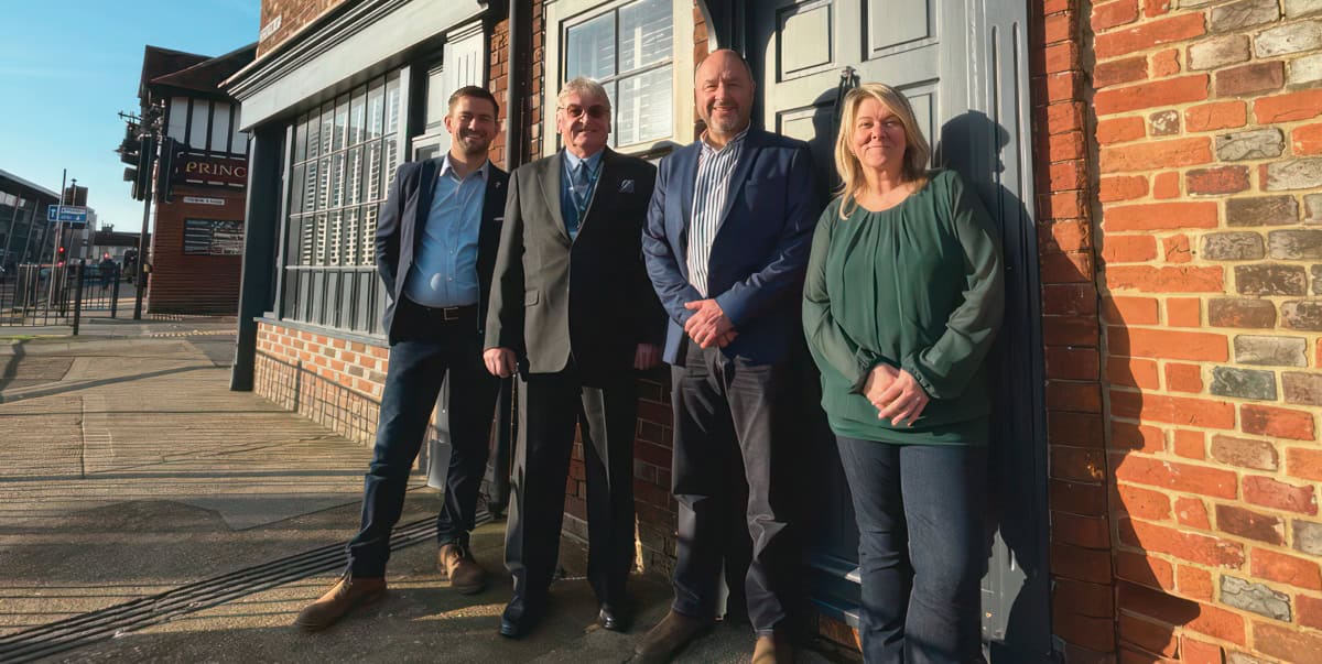 CAB staff and Robert outside the new building