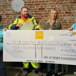 Yetta Elkins and others with giant cheque from Isle of Wight Foundation