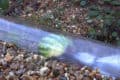 Jet equipment in a transparent tube shifting a melon to demonstrate how fatbergs are unblocked from sewers