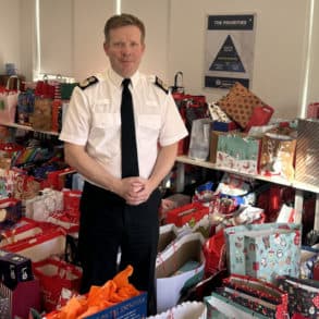 Scott Chilton with all of the presents