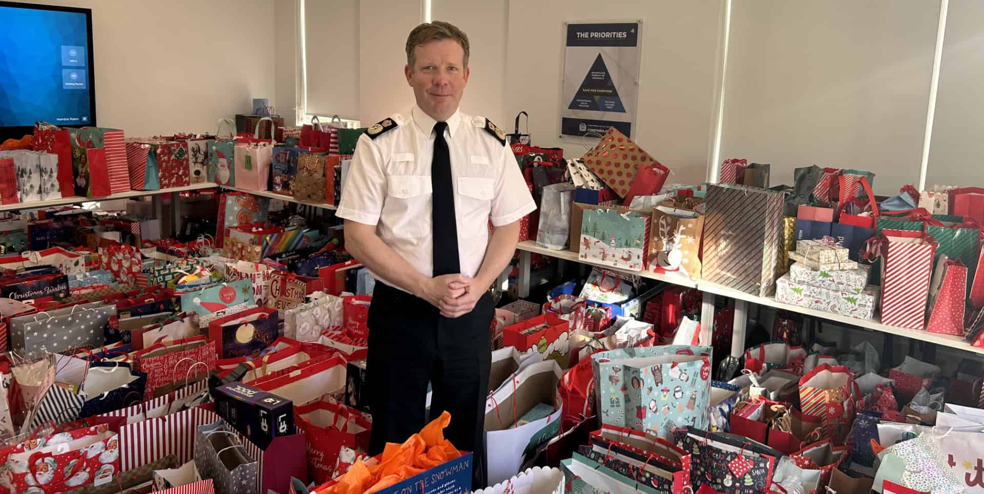 Scott Chilton with all of the presents