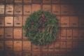 christmas wreath on a background of wooden drawers