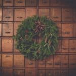 christmas wreath on a background of wooden drawers