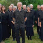 tritone singers - all dressed in black ready to perform