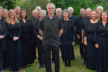 tritone singers - all dressed in black ready to perform