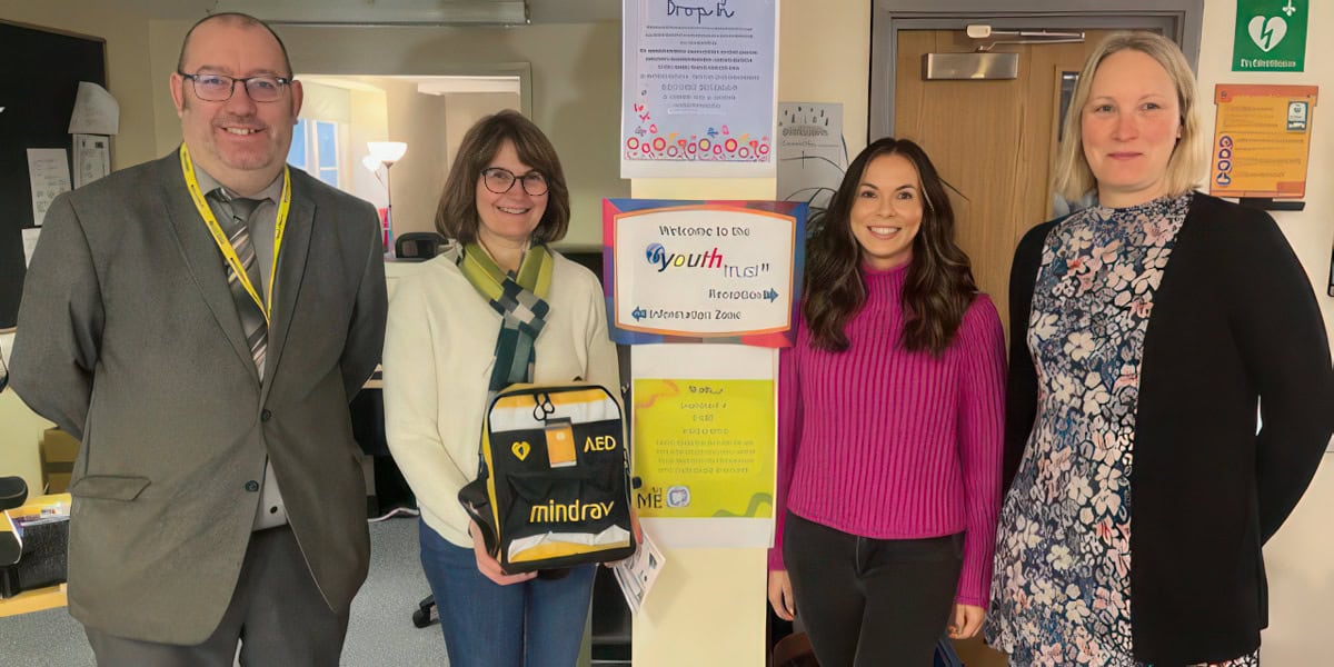 People from Youth Trust and Glanvilles with Defibrillator