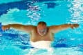 Person swimming in a pool