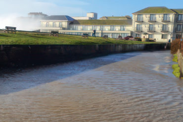 Freshwater flooding across the road