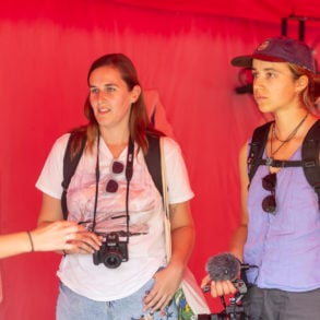 Two volunteers filming at the Fringe festival