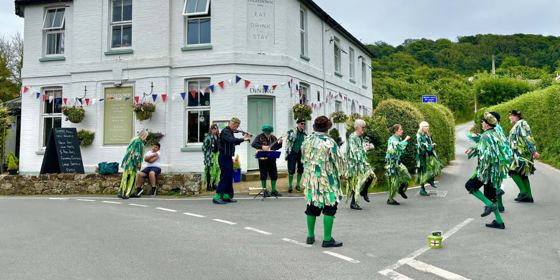 Mr Bakers Dozen morris side dancing at The Highdown 2024