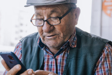 Older man using a smart phone