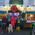 Sally Cass and Cowes RNLI volunteers outside the Duke of York