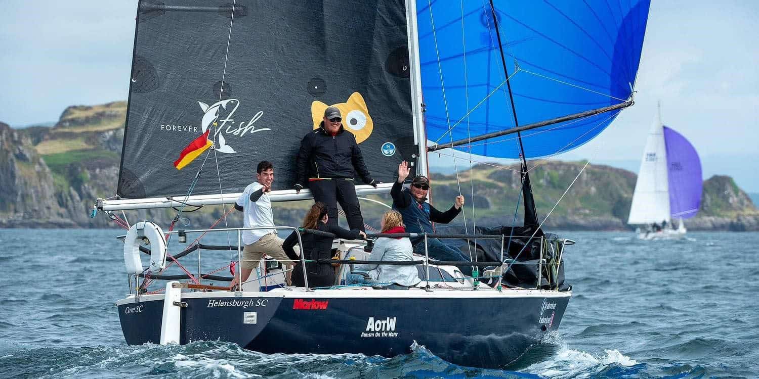 Autism on the Water members sailing a yacht off the Island