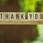 wooden blocks spelling out 'thank you'