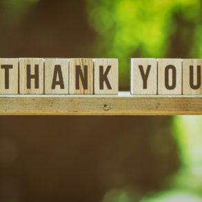 wooden blocks spelling out 'thank you'