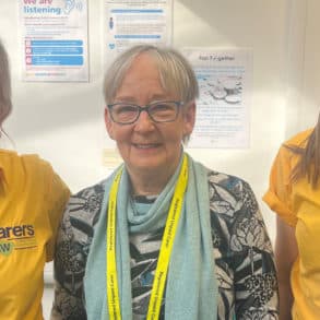 Three carers with their temporary carers passports