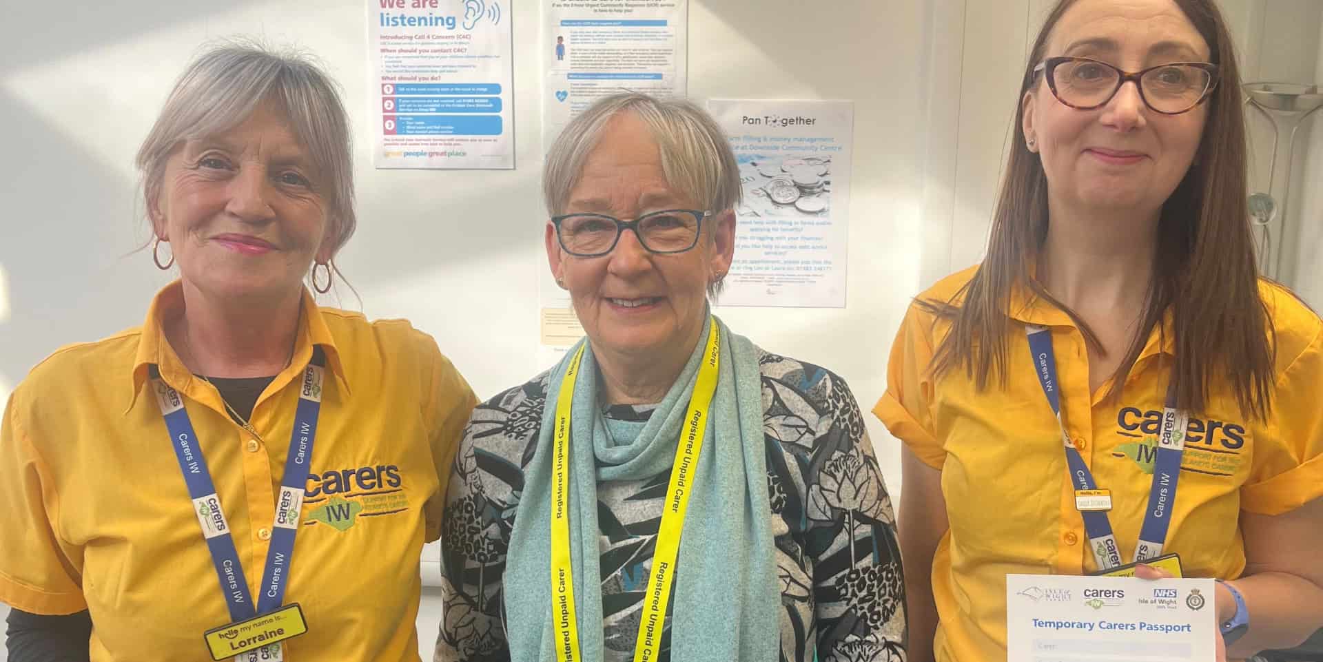 Three carers with their temporary carers passports