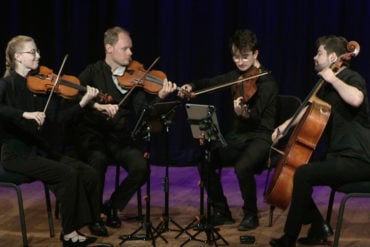 Fibonacci string quartet performing on stage