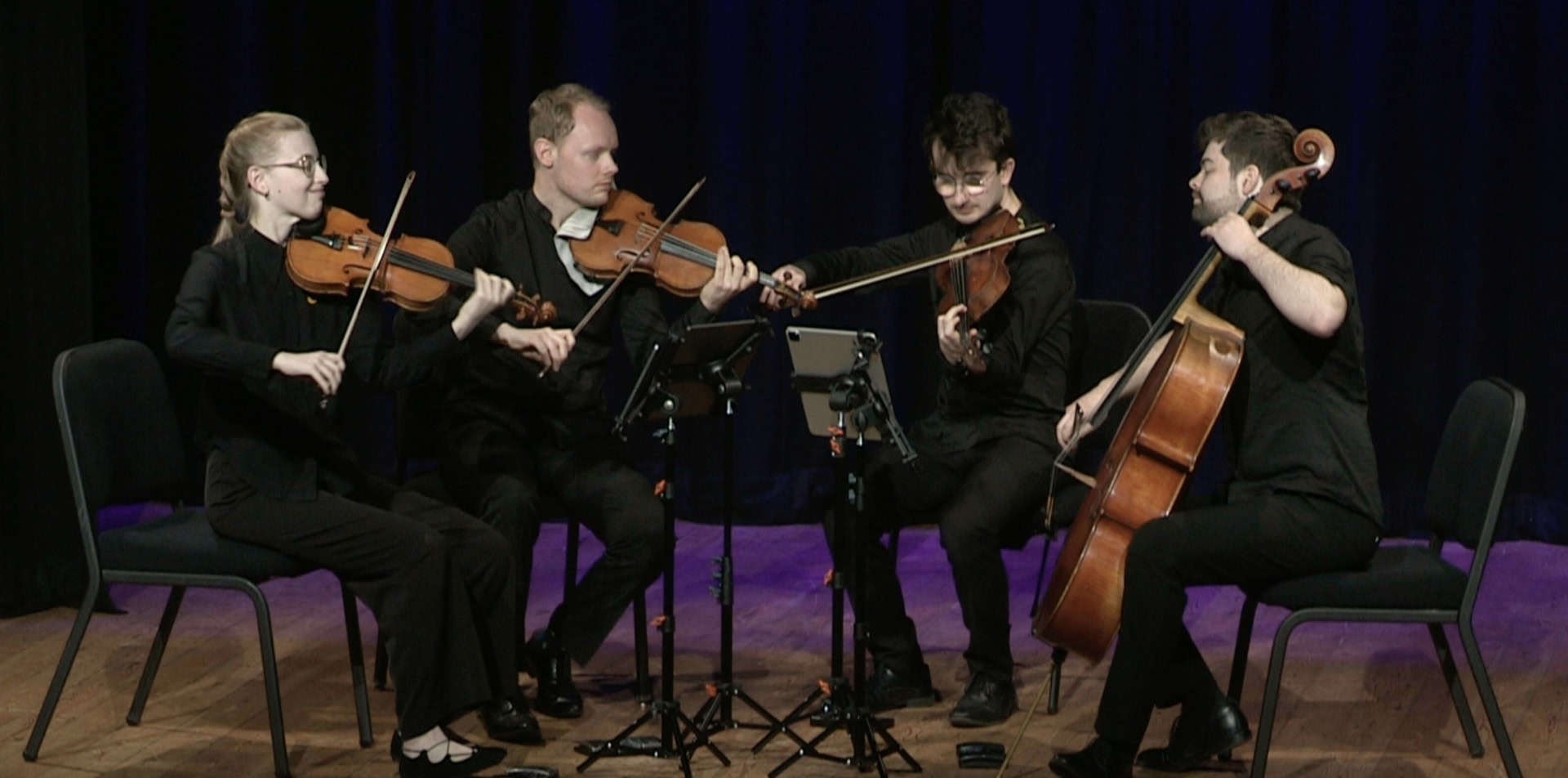 Fibonacci string quartet performing on stage