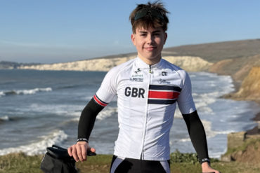 Harrison Hendy standing by his bike on on the Isle of Wight