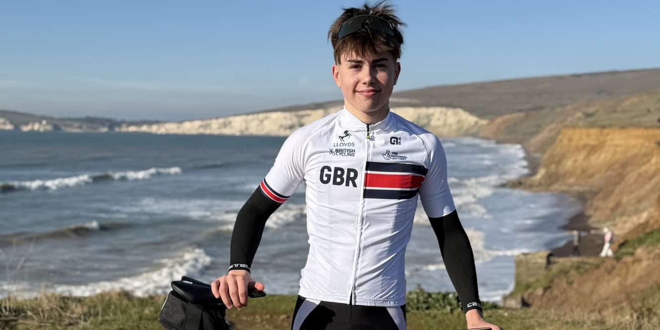 Harrison Hendy standing by his bike on on the Isle of Wight