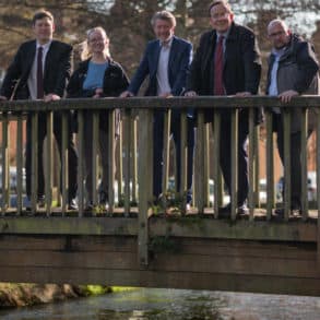 Cllr Philip North, Lorna Selby, Policy & Advocacy Officer at Hampshire & Isle of Wight Wildlife Trust, Cllr Philip Munday, Cllr Martin Tod and Cllr Steve Pitt, at the River Itchen in Winchester