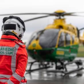 Paramedic standing by the air ambulance