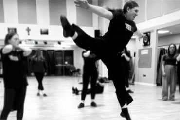 Theatretrain girls rehearsing and jumping high