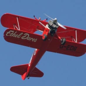 ethel dares plane in the sky with someone wing walking