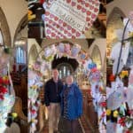 montage on photos from the church showing an arch of 'happy hearts'