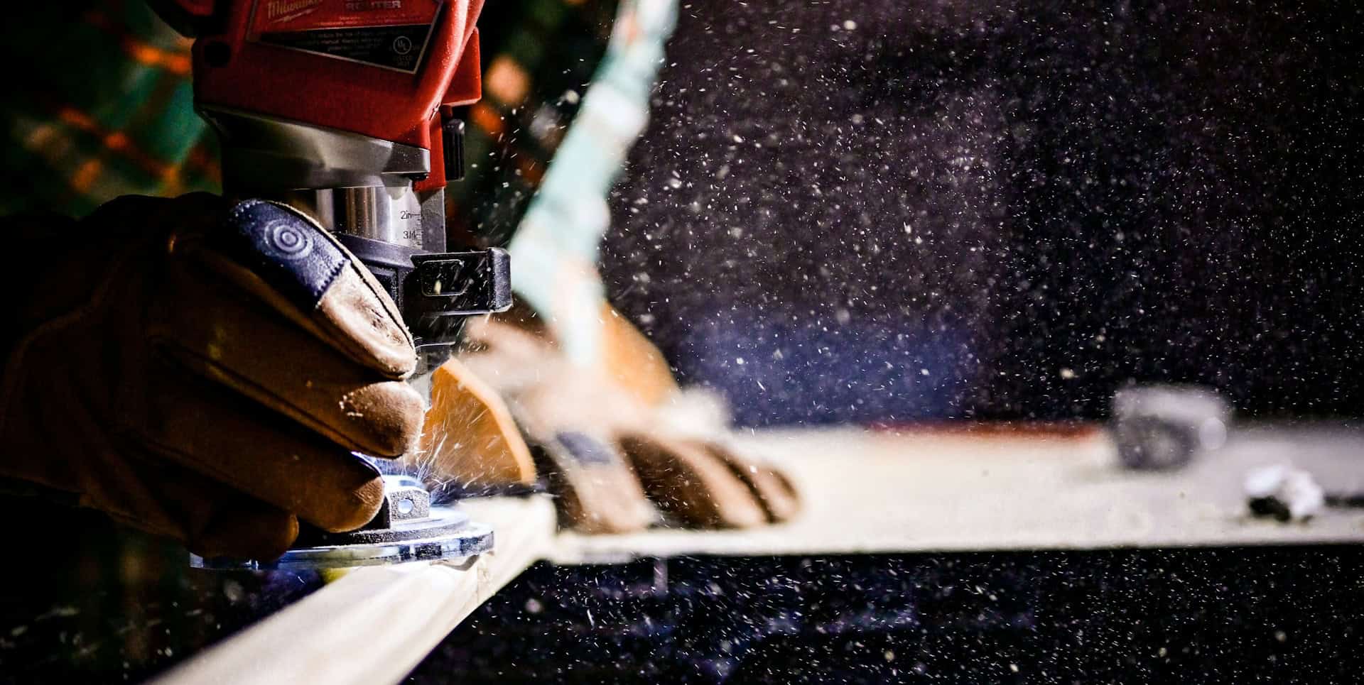 man holding power tool for carpentry work