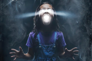 Illustration of girl with light scary shining from her eyes and mouth