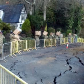 undercliff drive army carrying boxes