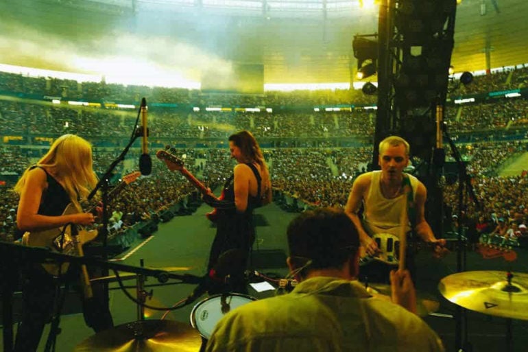 Coach Party performing at a stadium in France