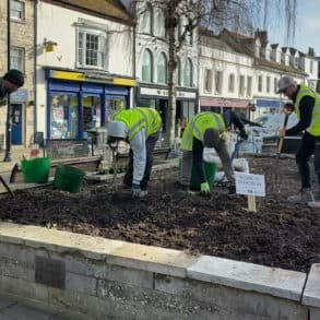 The students carrying out gardening work in Newport town square