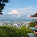 Mount Fuji in the background with Japanese temple in the foreground